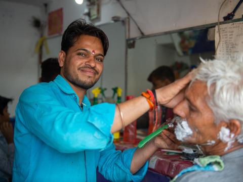 Hemant started his barbershop 13 years ago with a kit from World Vision India