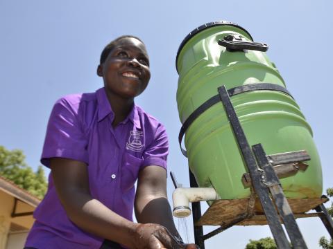 world vision Uganda water sanitation hygiene practices Pacer Primary School Agago District 