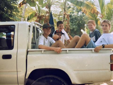 Andrea in a van with other teens