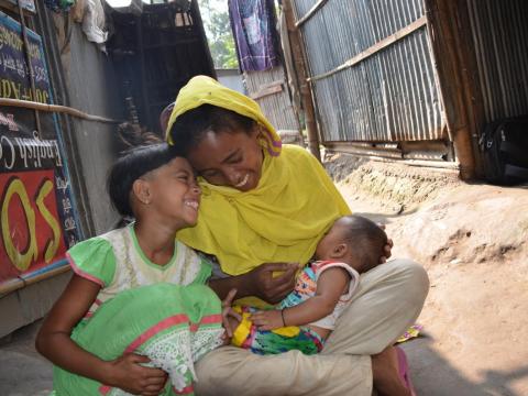 mother breastfeeds her child 