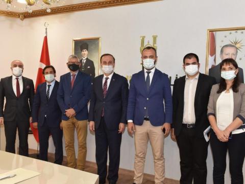 A group photo at the protocol signing ceremony