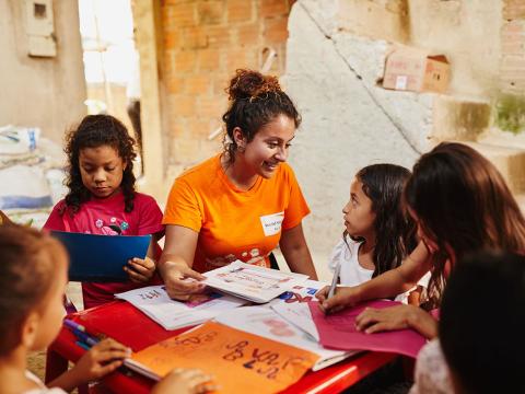 World Vision staff member works with children in Colombia