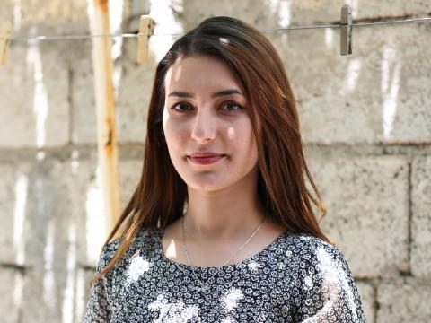 Ziney in her home at one of the reufgee camps in Erbil