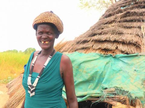 Woman who received livestock to support food