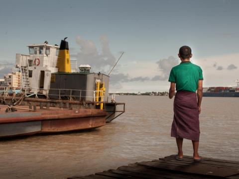 Myanmar man stands on the dock