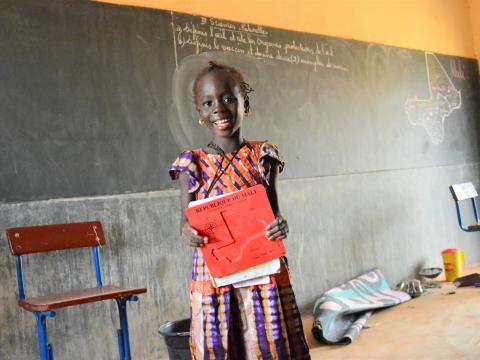 Little Aichata an 8-year-old student in 3rd grade living in Mali’s conflict-affected areas with her 