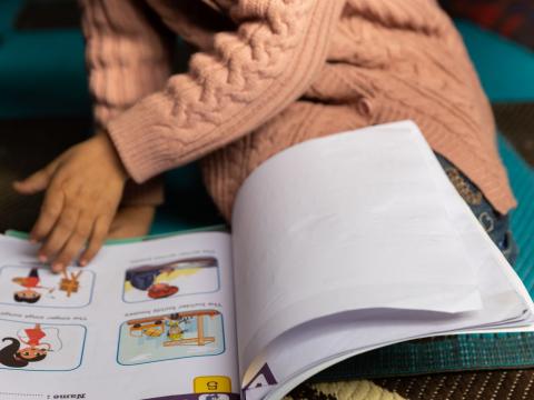 child with a book