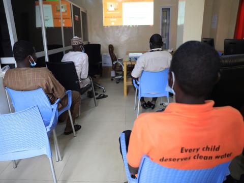 a group of staff observing the prayer day by video conference