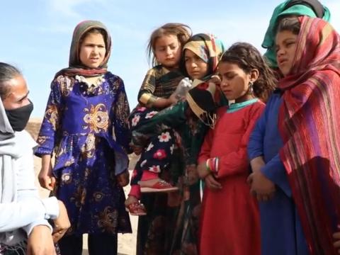 Asuntha Charles with girls in Afghanistan