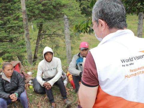 World Vision staff speaking to refugees from Venezuela