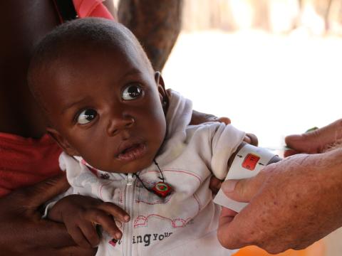 A Child in Angola is checked for malnutrition levels