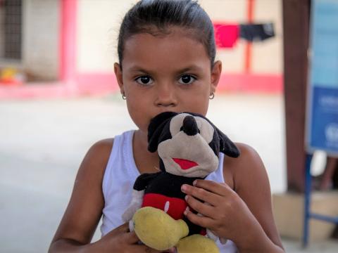 Ami from Venezuela with her Mickey Mouse doll