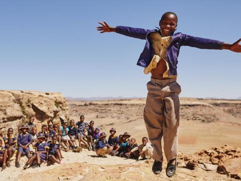 Child jumping in the air 