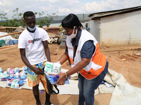 Patrick receiving school materials