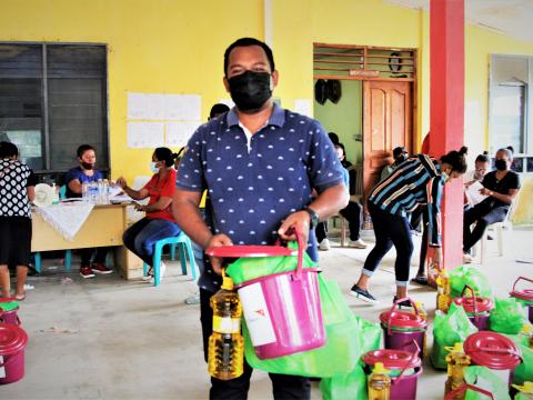 Natalino is receiving hygiene kits and food baskets from World Vision. Photo: Anita Marques/World Vision. 29 April 2021