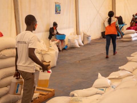 food staff moving food in food distribution