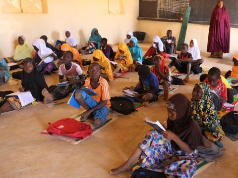 Children of other classes in Sakina school sitted on the floor
