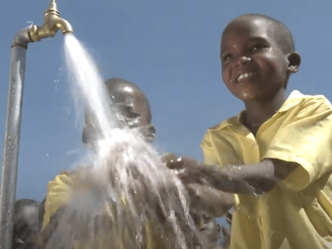 boys playing in water