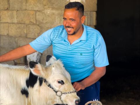 Arjan happy with his cow