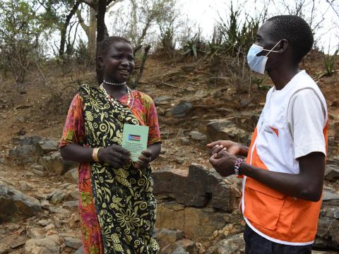 teaching people in South Sudan about COVID vaccination 