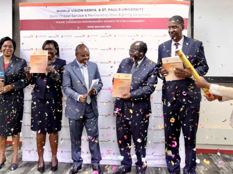 The World Vision Kenya senior leadership team with the St Paul's University Chancellor and Vice Chancellor celebrating the partnership.JPG