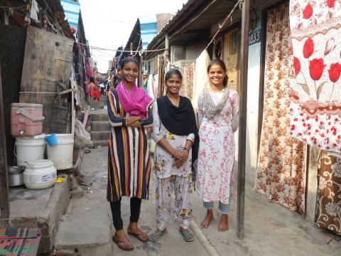 Three girls in a rag-picking community pursue education