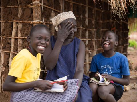 Eight-year old Doruka (yellow t-shirt) and her sister, Sejarina (blue t-shirt), 10 are lively, bright, cheeky, smiling South Sudanese girls who have been living in a refugee settlement in north-west Uganda since September 2017.