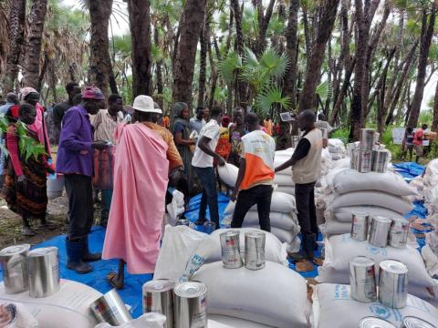 Displaced people are offered food assistance