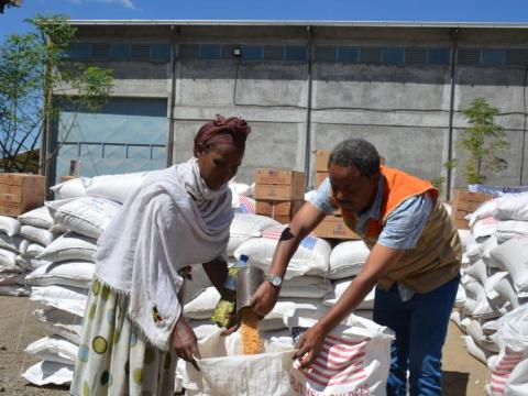 World Vision staff prepare food for distribution to hungry families in Northern Ethiopia 