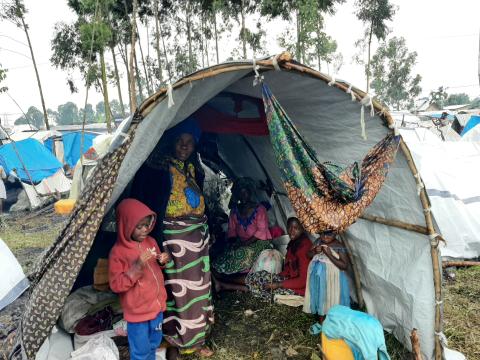 A displaced family in their shelter at Kanyaruchinya camp