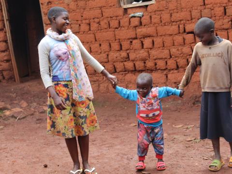 Aimé, 3-year-old boy, enjoys playing with others