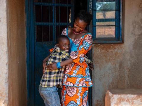 Mother in Africa hugs her child