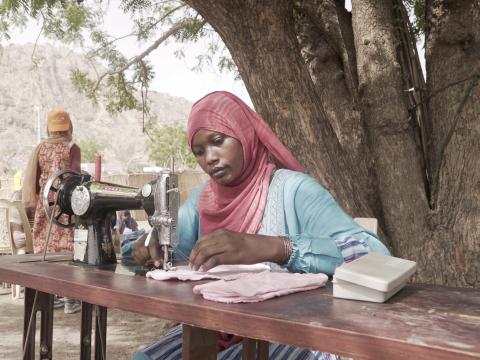 Woman making reusable sanitary towels