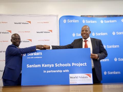 Gilbert Kamanga, National Director, World Vision Kenya( left) and Dr. Patrick Tumbo, Sanlam Kenya Group CEO Dr. Nyamemba Tumbo launch a partnership that will see Sanlam Kenya invest Ksh21.1 million to improve schools’ infrastructure in Kitui and Nyeri Counties; an initiative that will be implemented by World Vision Kenya.