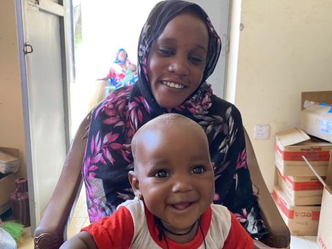 Mother with her child treated for malnutrition in a World Vision Sudan clinic