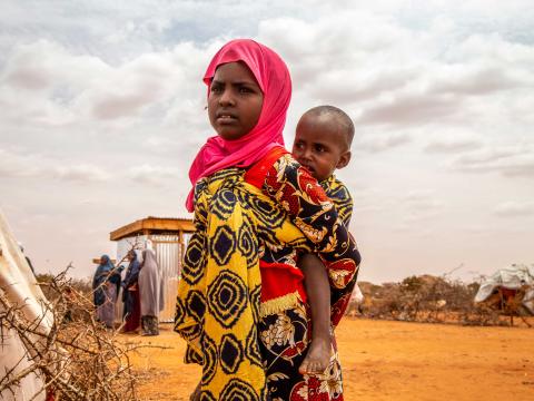 Forced to flee their homes due to either conflict or drought or both, children like 10-year-old Ebyan (and women) make up the majority of the population living in makeshift settlements. 