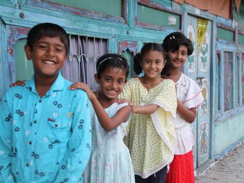 a group of children smiling