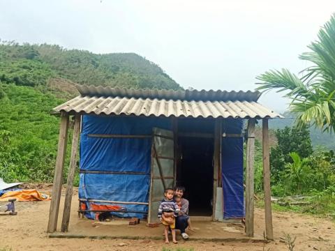 Photo 1: Back in those days, whenever a storm came, Tuấn, his wife, and two young children would seek shelter in the chicken coop