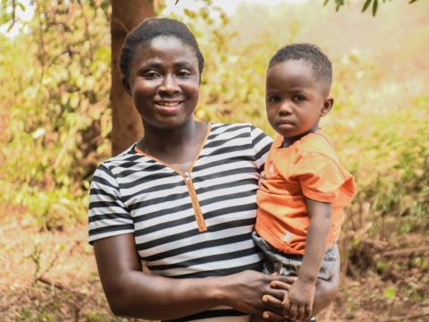 Evelyn, IFP beneficiary in Kwabia with her son. 