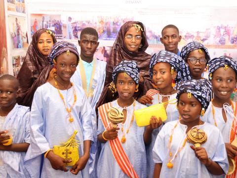Children in traditional clothes during the ceremony