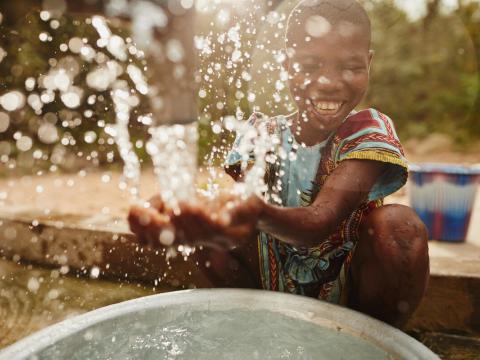 A child playing with water