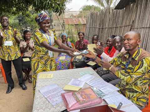 Cecile attending her Saving group activity