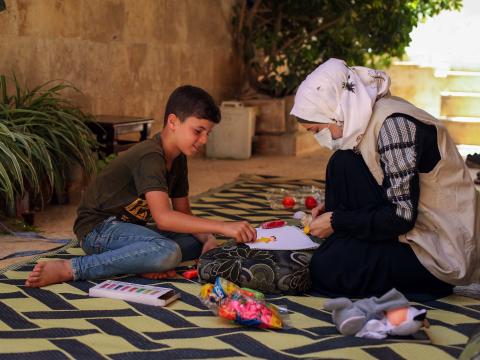 Action for Humanity, World Vision Syria Response Baker with our partner staff during a psychological support activity.