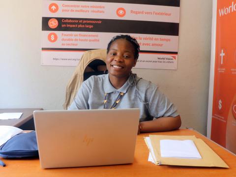 Manuela, World Vision staff in her office