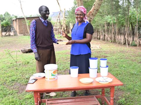 Musa and his wife sell honey produced in their apiary to earn extra household income. ©World Vision Photo/Hellen Owuor.