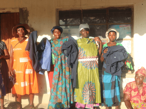 Tendaiishe Sewing Group members pose for a group photo 