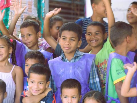 Los niños migrantes que participan en los espacios amigos de la infancia de World Vision reciben apoyo educativo, psicoemocional y cultural.
