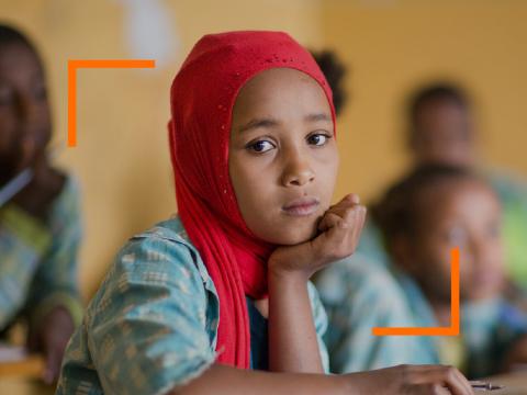 Temesgen, an Ethiopian girl sitting in school