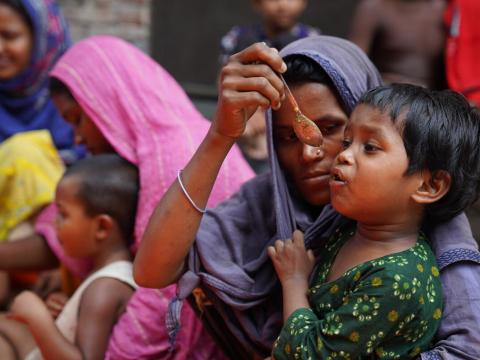 Bangladesh child being fed