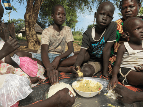 childhood rescue, children eating food in Africa